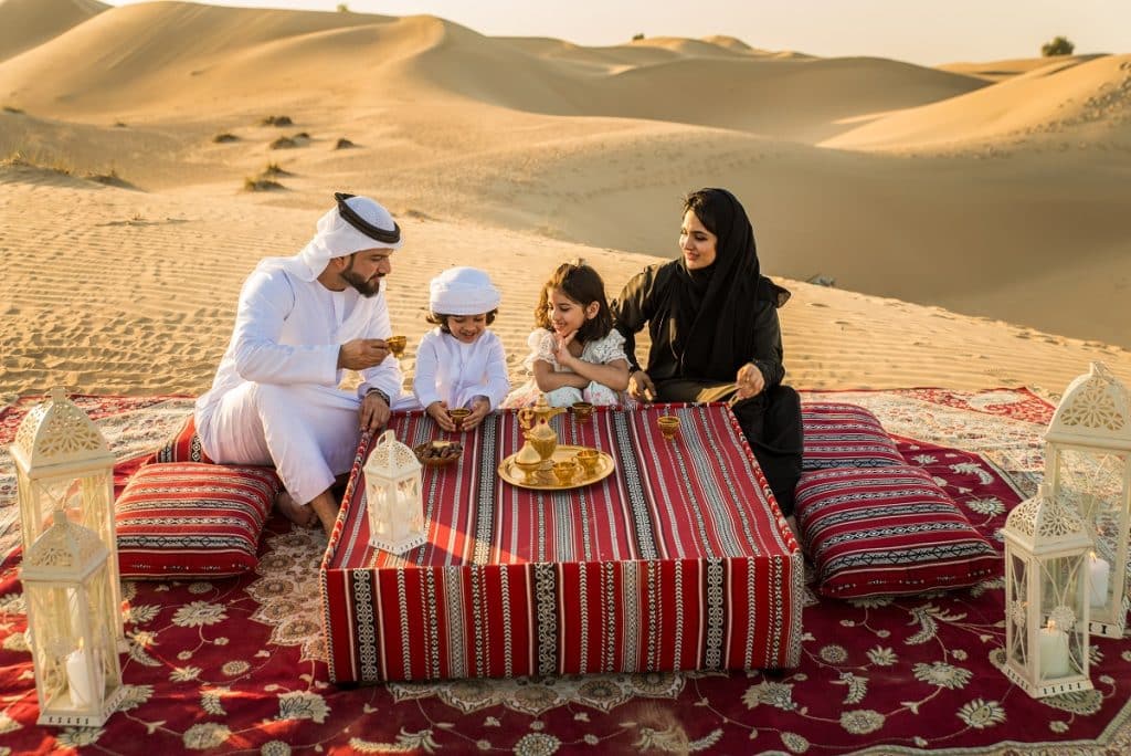 Arabian family in the desert